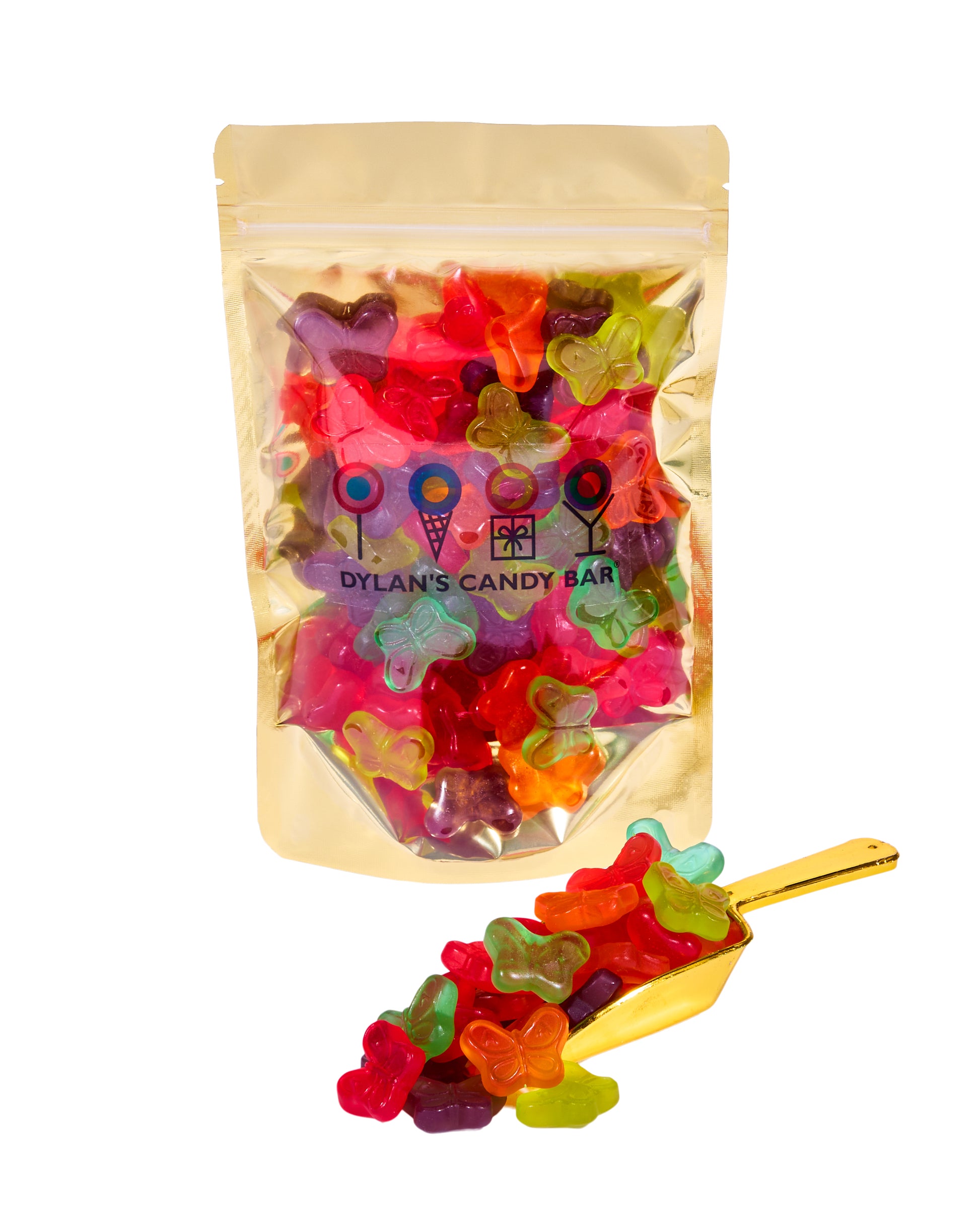 Fruity Mini Rainbow Gummy Butterflies in resealable gold mylar bag next to Fruity Mini Rainbow Gummy Butterflies overflowing from gold scoop