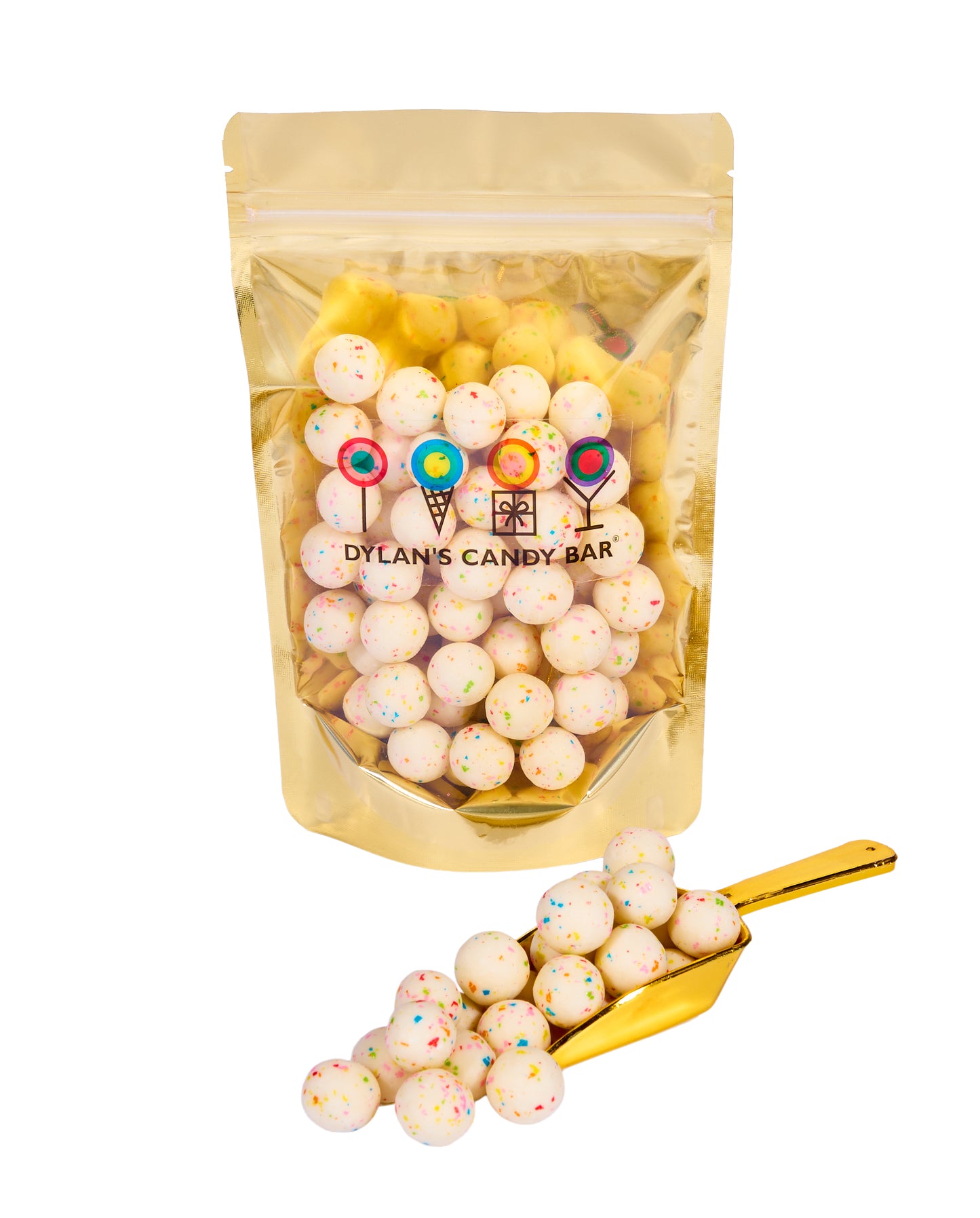 Vanilla Birthday Cake Bites in resealable gold mylar bag next to Vanilla Birthday Cake Bites overflowing from gold scoop