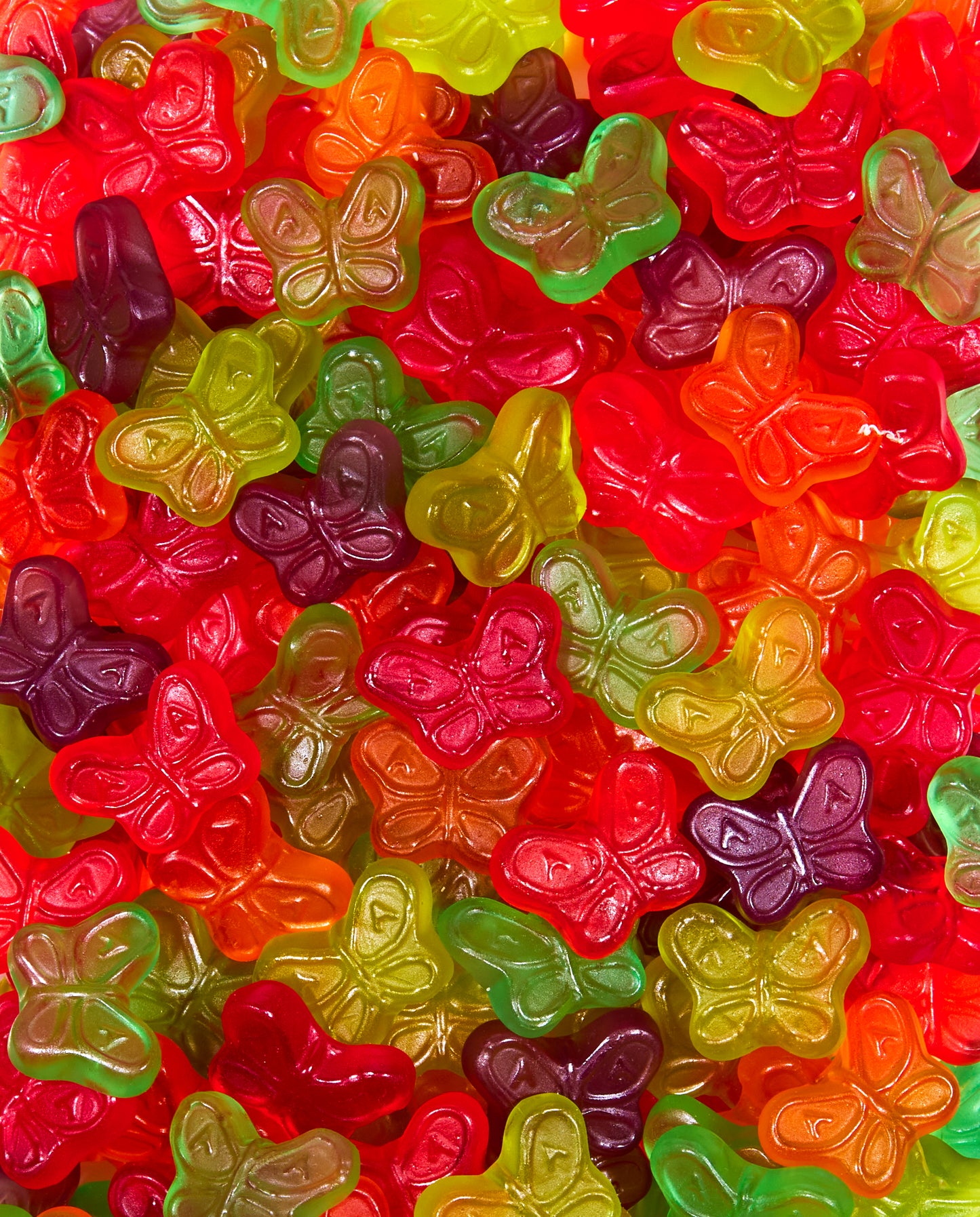 Zoomed-in Fruity Mini Rainbow Gummy Butterflies